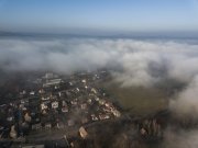 Clouds and houses drone photography